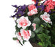 Artificial Purple Pansy, Pink Azalea and Geranium Display in a 12″ Round Willow Hanging Basket - Closer2Nature